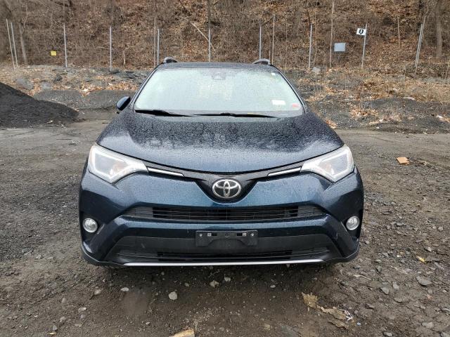 Photo 5 from auction – 2017 TOYOTA RAV4 XLE with VIN JTMRFREV5HJ122180