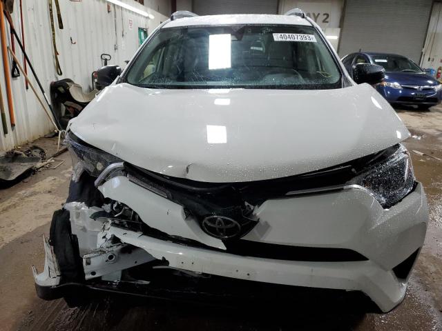 Photo 5 from auction – 2018 TOYOTA RAV4 LE with VIN JTMZFREV3JJ178091