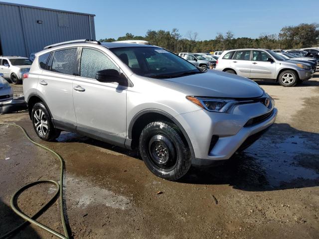 Photo 4 from auction – 2018 TOYOTA RAV4 LE with VIN 2T3ZFREV8JW493356