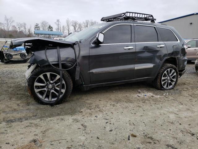 JEEP GRAND CHER 2011 with VIN 1J4RR4GG5BC555058 - Photo from auction