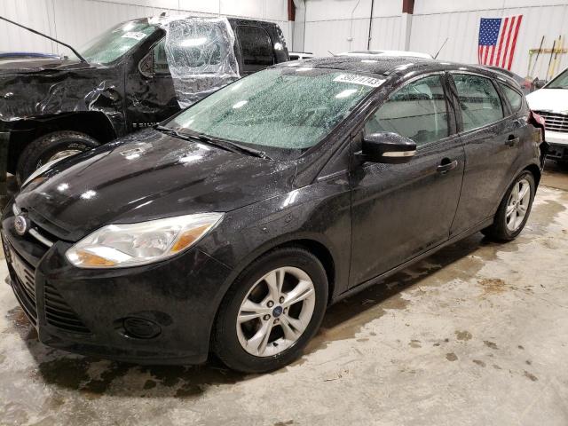 FORD FOCUS SE 2014 with VIN 1FADP3K21EL413621 - Photo from auction