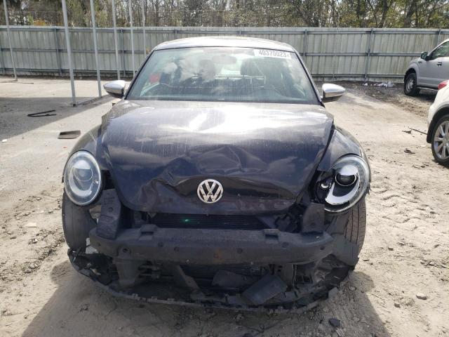 Photo 5 from auction – 2013 VOLKSWAGEN BEETLE with VIN 3VWJP7AT0DM678782