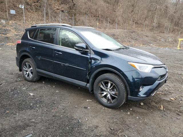 Photo 4 from auction – 2017 TOYOTA RAV4 XLE with VIN JTMRFREV5HJ122180