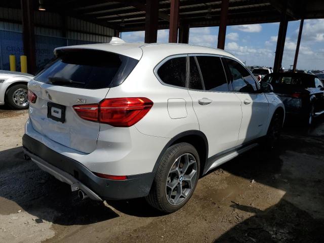 Photo 3 from auction – 2018 BMW X1 XDRIVE2 with VIN WBXHT3C30J5K24118