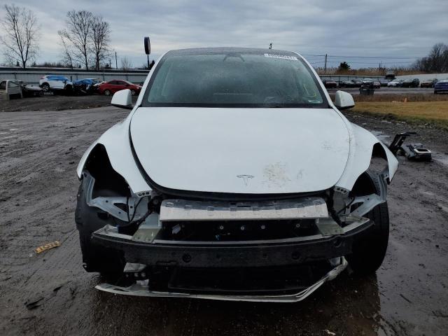Photo 5 from auction – 2021 TESLA MODEL Y with VIN 5YJYGDEE4MF297792