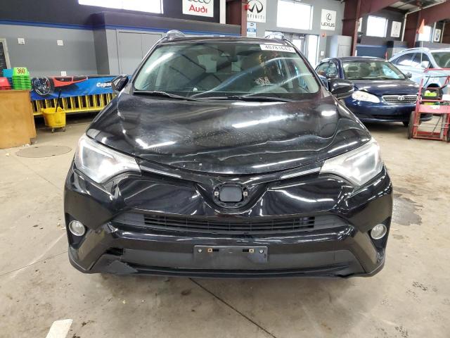 Photo 5 from auction – 2017 TOYOTA RAV4 XLE with VIN 2T3RFREV0HW652641