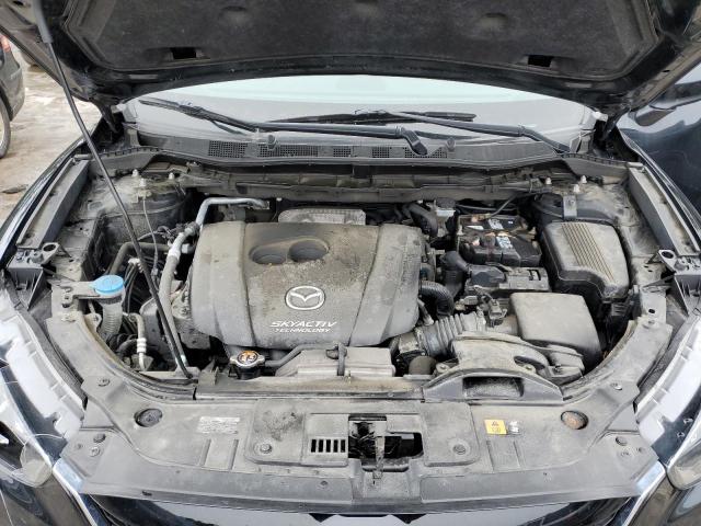 Photo 12 from auction – 2014 MAZDA CX-5 TOURI with VIN JM3KE4CY9E0341401