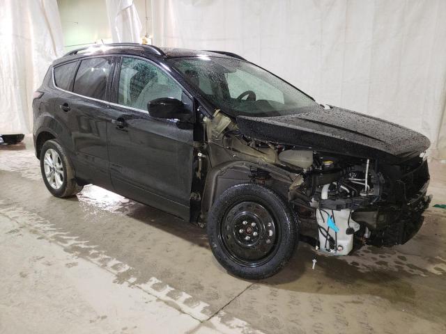 Photo 4 from auction – 2018 FORD ESCAPE SE with VIN 1FMCU0GD4JUA89507