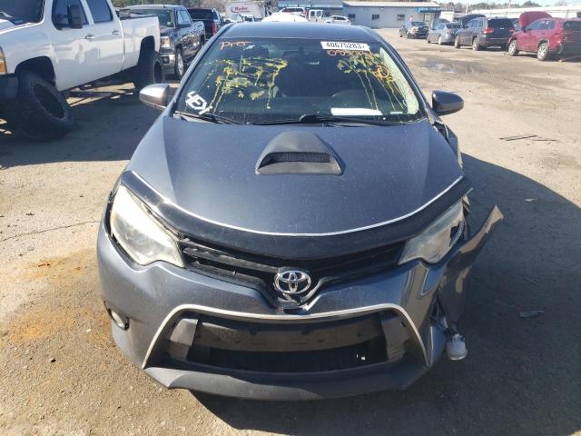 Photo 5 from auction – 2014 TOYOTA COROLLA EC with VIN 5YFBPRHE1EP083721