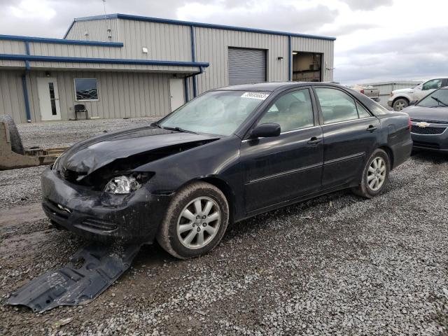 TOYOTA CAMRY LE 2002 with VIN 4T1BF30K02U022677 - Photo from auction