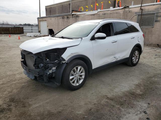 KIA SORENTO LX 2016 with VIN 5XYPG4A32GG012956 - Photo from auction
