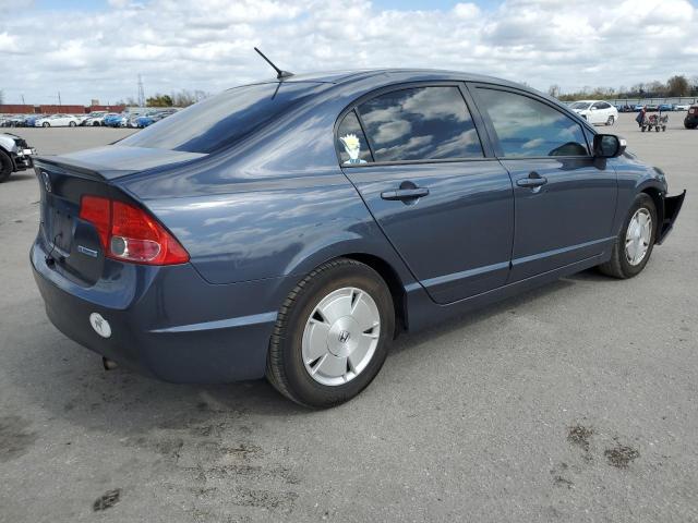 Photo 3 from auction – 2006 HONDA CIVIC HYBR with VIN JHMFA362X6S014601