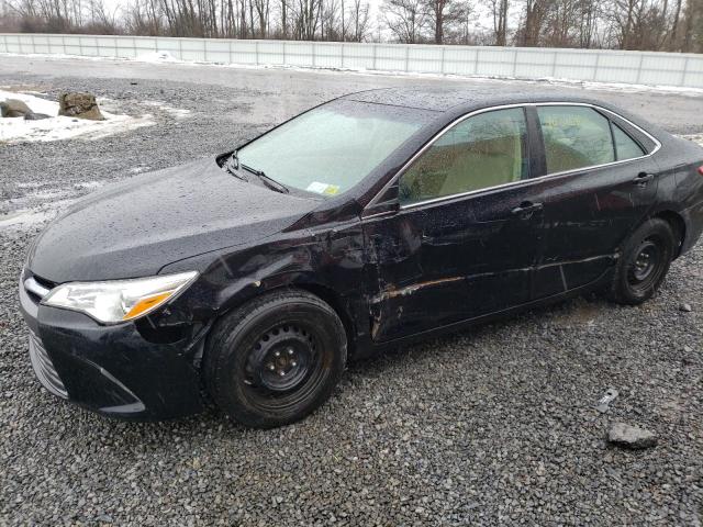 TOYOTA CAMRY LE 2017 with VIN 4T1BF1FK0HU410951 - Photo from auction