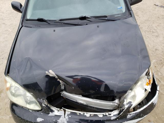 Photo 11 from auction – 2003 TOYOTA COROLLA with VIN 1NXBR32E73Z094735