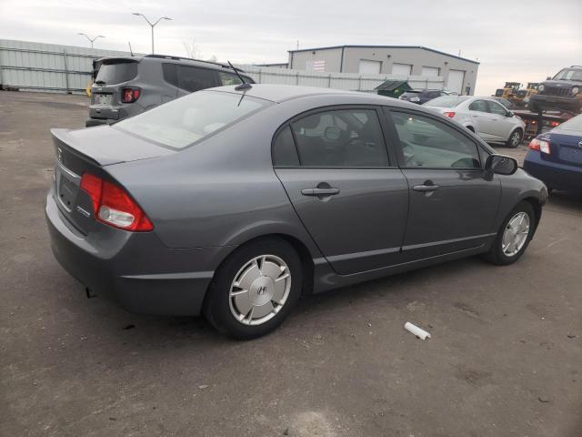 Photo 3 from auction – 2010 HONDA CIVIC HYBR with VIN JHMFA3F21AS007660
