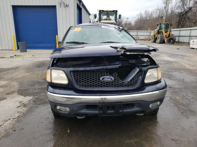 Photo 5 from auction – 2000 FORD F150 with VIN 1FTRX18WXYNB64100