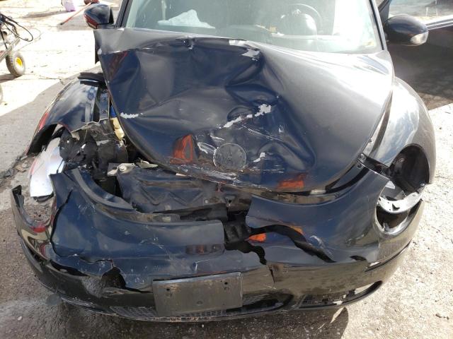 Photo 11 from auction – 2010 VOLKSWAGEN NEW BEETLE with VIN 3VWPW3AG0AM017953