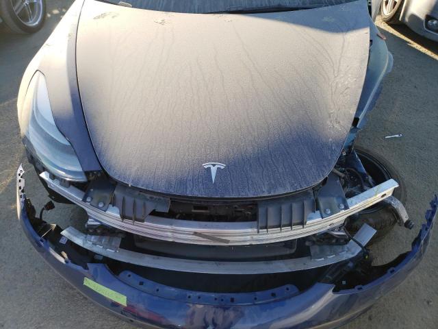 Photo 11 from auction – 2022 TESLA MODEL 3 with VIN 5YJ3E1EA0NF105345