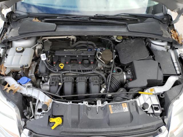 Photo 11 from auction – 2014 FORD FOCUS S with VIN 1FADP3E20EL387296