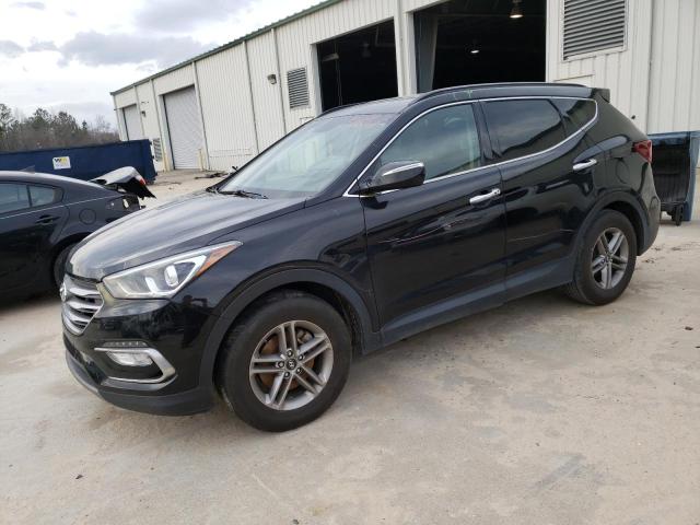 HYUNDAI SANTA FE S 2017 with VIN 5NMZU3LBXHH052354 - Photo from auction