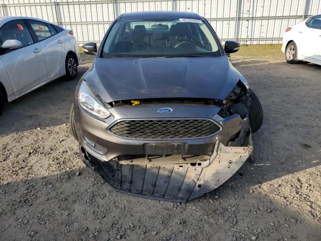 Photo 5 from auction – 2016 FORD FOCUS SE with VIN 1FADP3F22GL384272