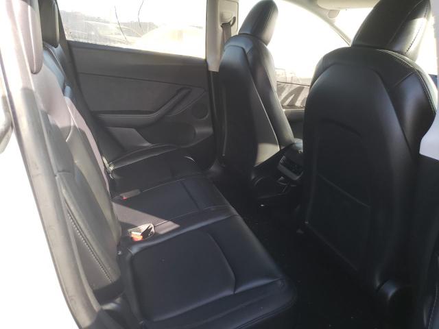 Photo 11 from auction – 2021 TESLA MODEL Y with VIN 5YJYGDEE9MF067794