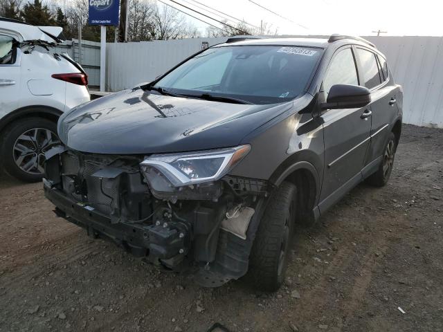 Photo 1 from auction – 2018 TOYOTA RAV4 LE with VIN 2T3BFREV0JW831317