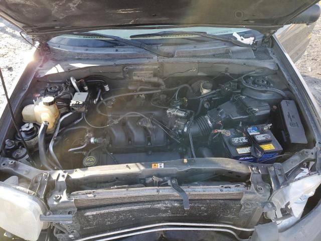 Photo 12 from auction – 2004 FORD ESCAPE XLS with VIN 1FMYU92184DA19830