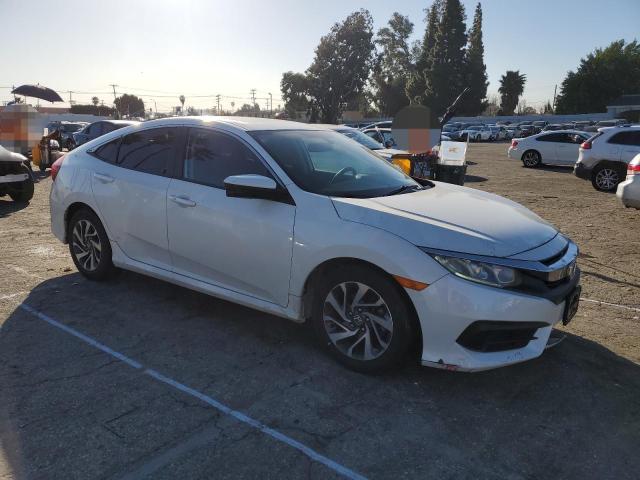 Photo 4 from auction – 2018 HONDA CIVIC EX with VIN 19XFC2F71JE206664