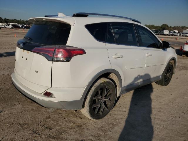 Photo 3 from auction – 2016 TOYOTA RAV4 SE with VIN JTMNFREV5GJ075116