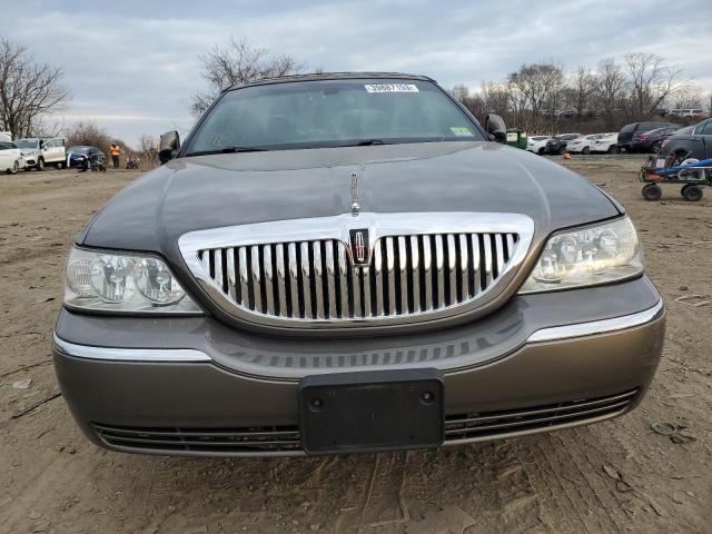 Photo 5 from auction – 2004 LINCOLN TOWN CAR E with VIN 1LNHM81WX4Y633102