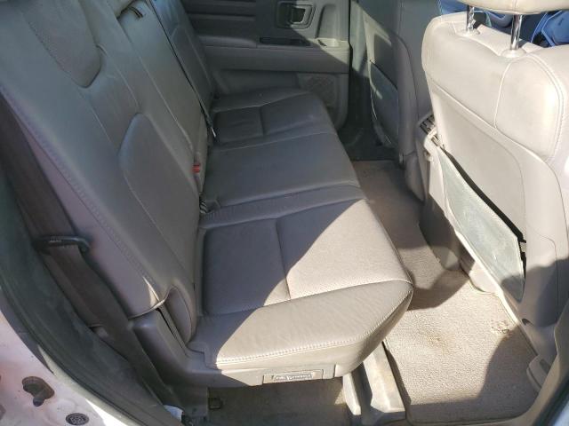 Photo 10 from auction – 2010 HONDA RIDGELINE with VIN 5FPYK1F55AB011804