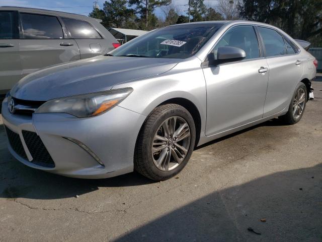 TOYOTA CAMRY LE 2017 with VIN 4T1BF1FK1HU709476 - Photo from auction