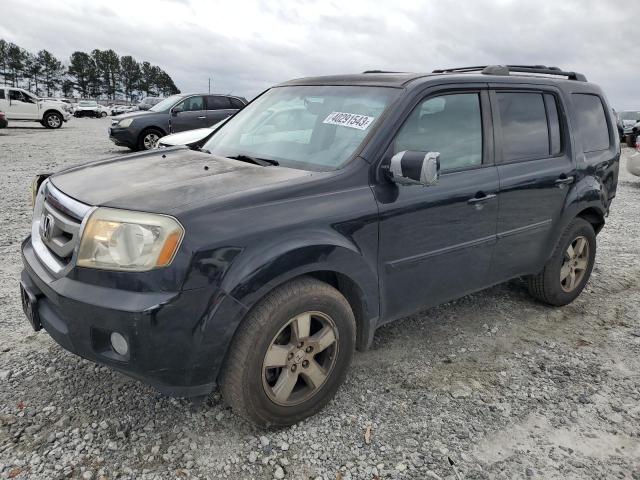 HONDA PILOT EXLN 2011 with VIN 5FNYF3H74BB022964 - Photo from auction