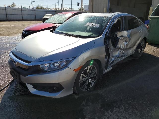 HONDA CIVIC EX 2018 with VIN JHMFC1F38JX002966 - Photo from auction