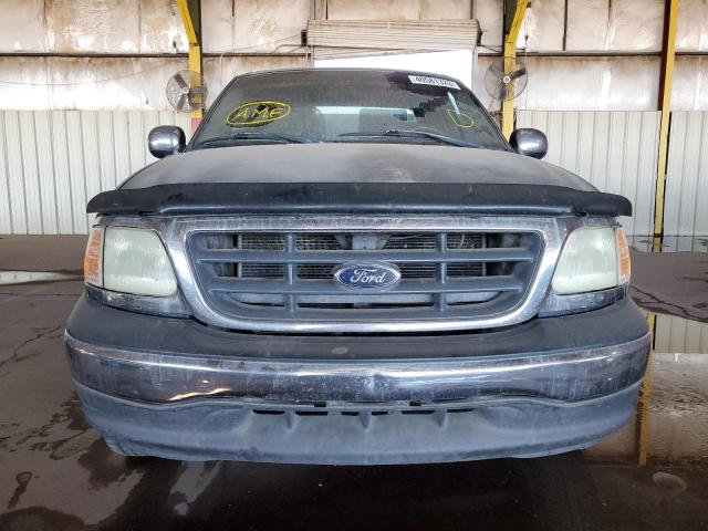 Photo 5 from auction – 2002 FORD F150 with VIN 1FTRX17L32NA33816