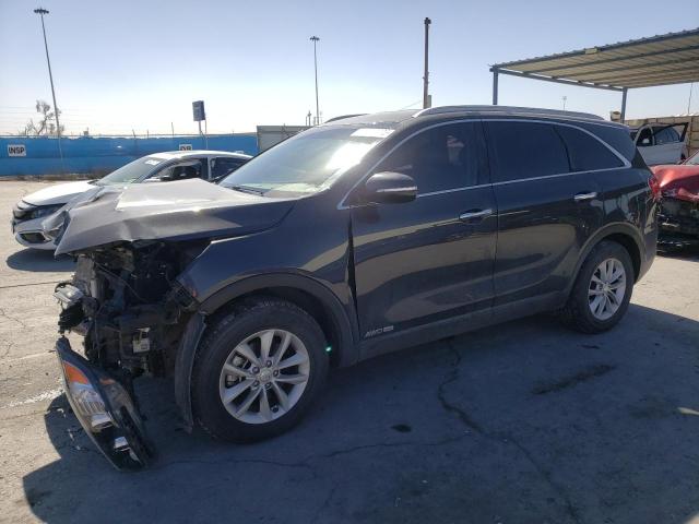 KIA SORENTO LX 2018 with VIN 5XYPGDA59JG402901 - Photo from auction