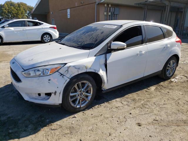 FORD FOCUS SE 2015 with VIN 1FADP3K25FL222883 - Photo from auction