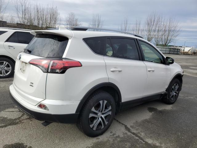 Photo 3 from auction – 2018 TOYOTA RAV4 LE with VIN JTMBFREV2JJ208165