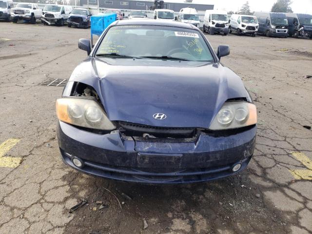 Photo 5 from auction – 2004 HYUNDAI TIBURON with VIN KMHHM65D74U126615