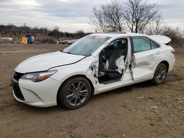 TOYOTA CAMRY LE 2017 with VIN 4T1BF1FKXHU319976 - Photo from auction