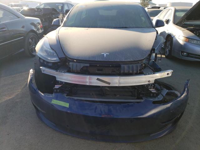 Photo 5 from auction – 2022 TESLA MODEL 3 with VIN 5YJ3E1EA0NF105345
