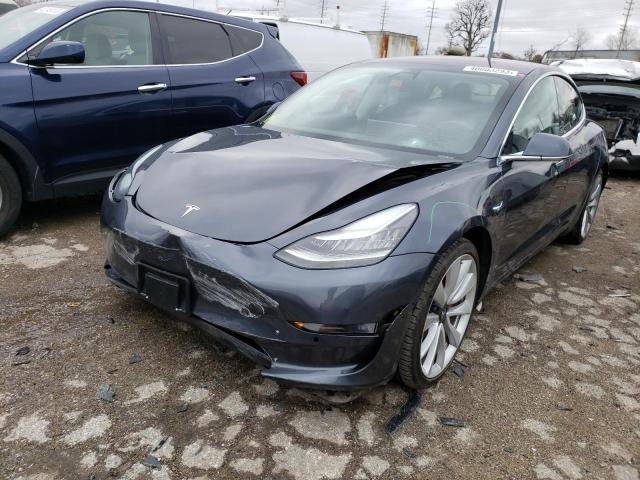 TESLA MODEL 3 2018 with VIN 5YJ3E1EB9JF183173 - Photo from auction