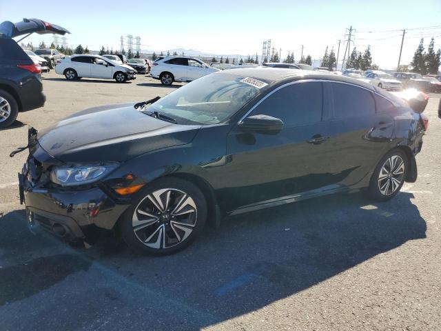 HONDA CIVIC EXL 2017 with VIN 2HGFC1F72HH654552 - Photo from auction