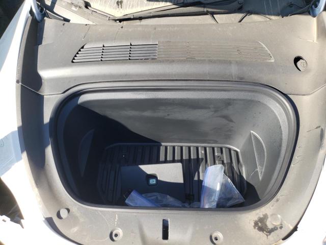 Photo 12 from auction – 2021 TESLA MODEL Y with VIN 5YJYGDEE9MF067794