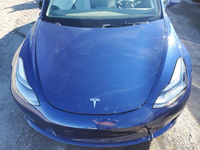 Photo 11 from auction – 2022 TESLA MODEL 3 with VIN 5YJ3E1EB4NF139135