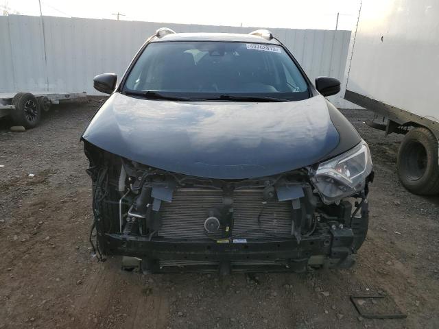Photo 5 from auction – 2018 TOYOTA RAV4 LE with VIN 2T3BFREV0JW831317