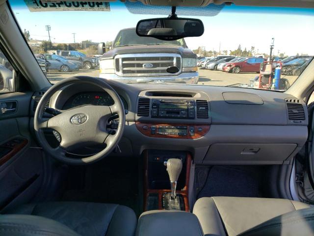 Photo 8 from auction – 2003 TOYOTA CAMRY LE with VIN 4T1BF30KX3U059849