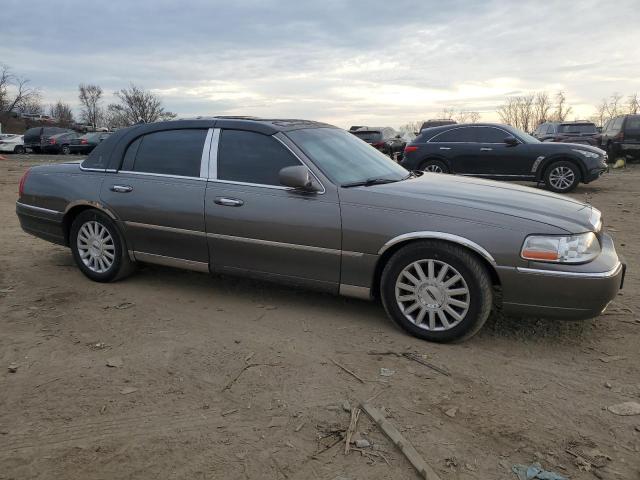 Photo 4 from auction – 2004 LINCOLN TOWN CAR E with VIN 1LNHM81WX4Y633102