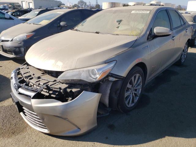 TOYOTA CAMRY HYBR 2016 with VIN 4T1BD1FK9GU181304 - Photo from auction